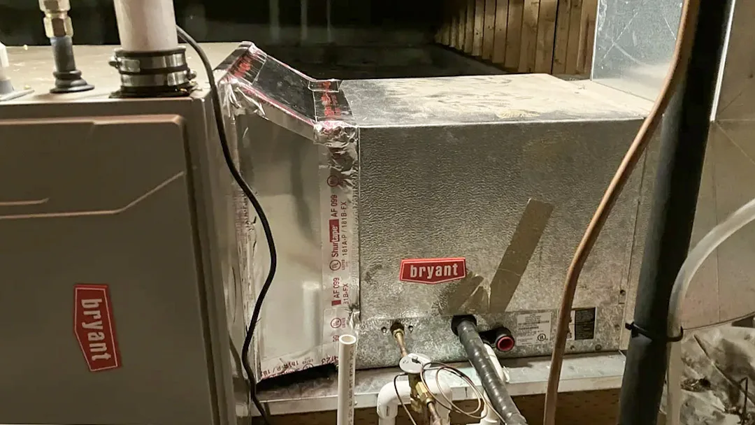Close-up view of a newly installed Bryant Preferred high-efficiency gas furnace in a Victor, Idaho home.